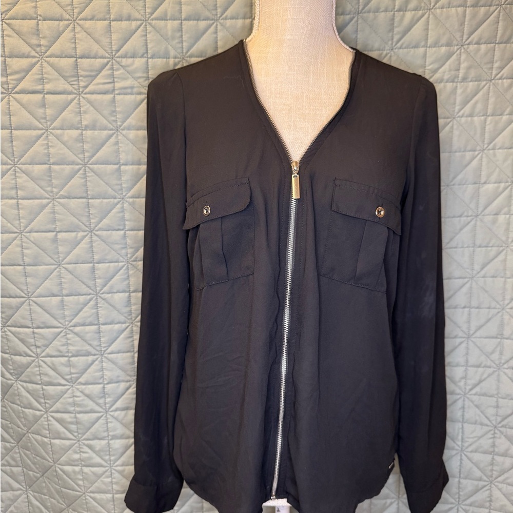 Guess Women's Black Long Sleeve Top. Full Gold Tone Zip Front Closure.